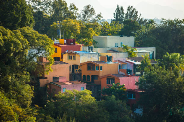 Beautiful Cuernavaca city landscape with houses Beautiful Cuernavaca city landscape with colored houses cuernavaca stock pictures, royalty-free photos & images