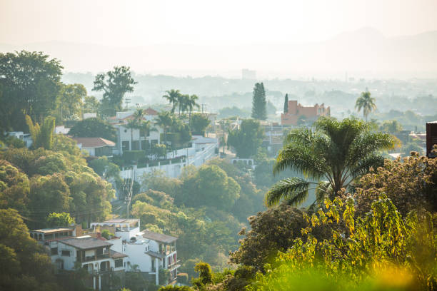 Beautiful Cuernavaca city landscape with houses Beautiful Cuernavaca city landscape with colored houses cuernavaca stock pictures, royalty-free photos & images