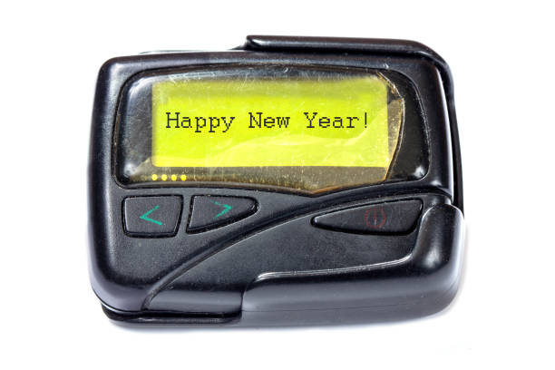 istock Old pager on a white background. The message on the screen: Happy New Year! 898593030