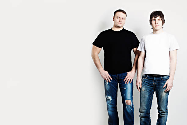 istock Men wearing T-Shirts on Background 898593098