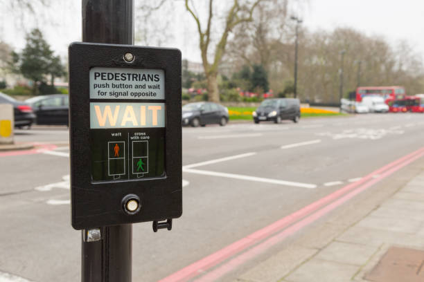 istock Pedestrian button indicating wait in London, UK 898602050
