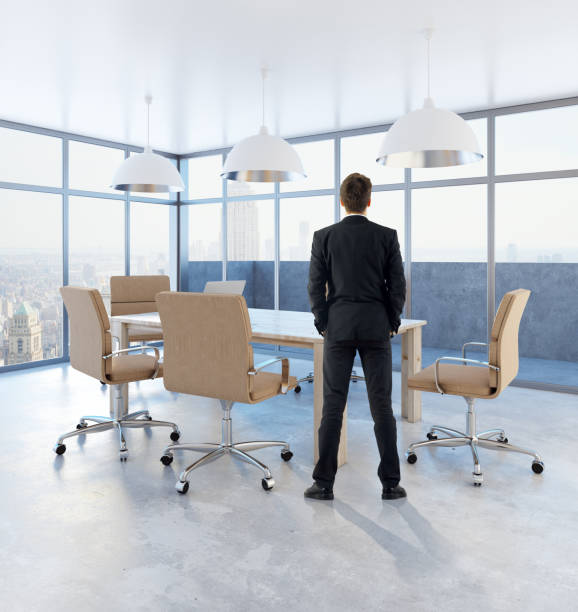 istock Businessman in conference room 898615444