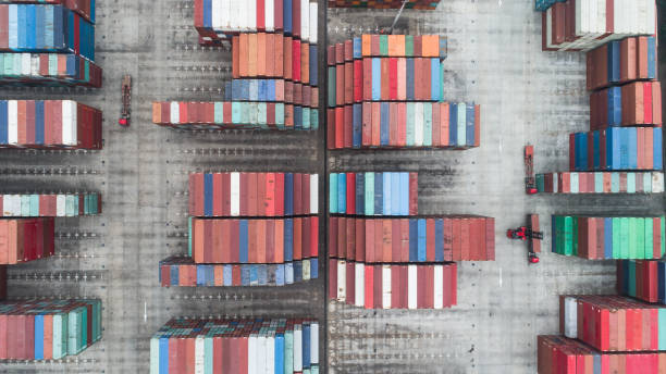 istock aerial view of loading and moving containers on container yard 898628694