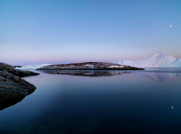 istock Arctic Icebergs on Arctic Ocean in Greenland 898629786