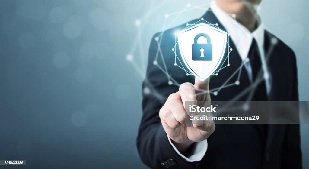 Businessman touching shield protect icon, Concept cyber security safe your data Encryption Stock Photo