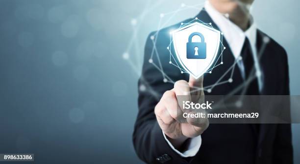 Businessman Touching Shield Protect Icon Concept Cyber Security Safe Your Data Stock Photo - Download Image Now