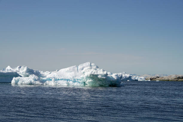 istock Arctic Icebergs on Arctic Ocean in Greenland 898644208