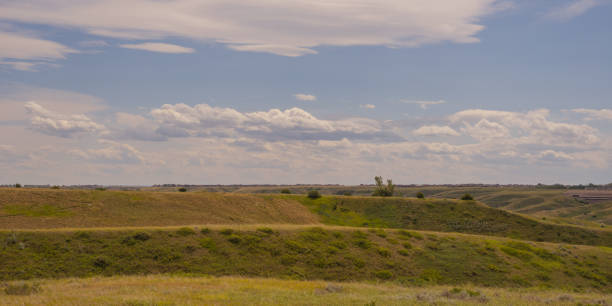 Cloudy Foothills Landscape. Landscape of foothills with a cloudy sky. lethbridge alberta stock pictures, royalty-free photos & images