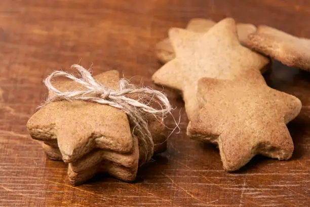 Gift for new year. Delicious dessert. Gingerbread stars.