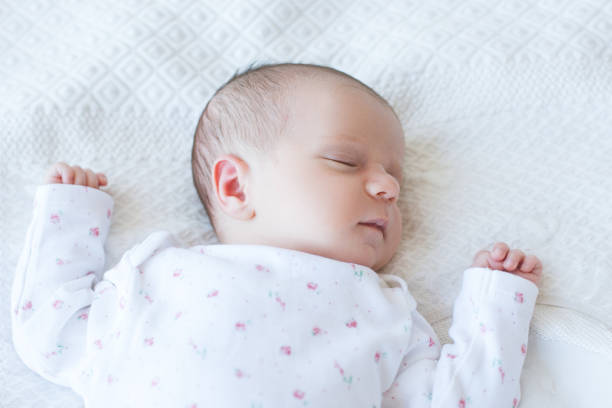 istock adorable sleeping newborn child 898664602
