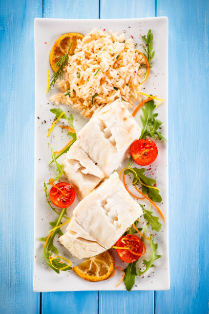 istock Fish dish - fried fish fillet and vegetables 898669974