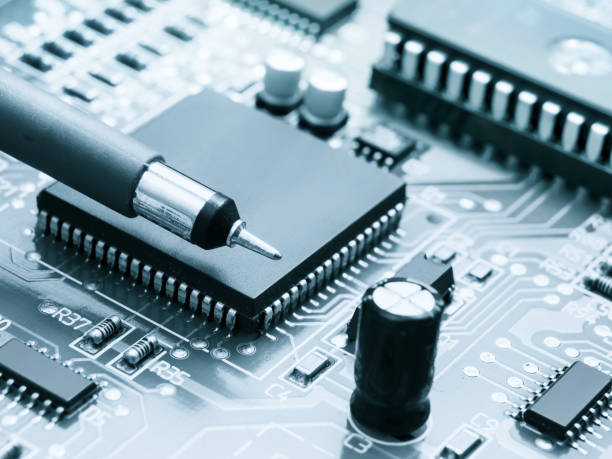 istock Circuit board with electronic components background. Electronic circuit board with parts 898670586