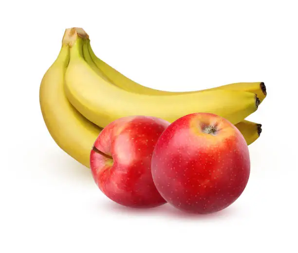 Photo of Bunch of ripe bananas and apples, isolated on a white background.