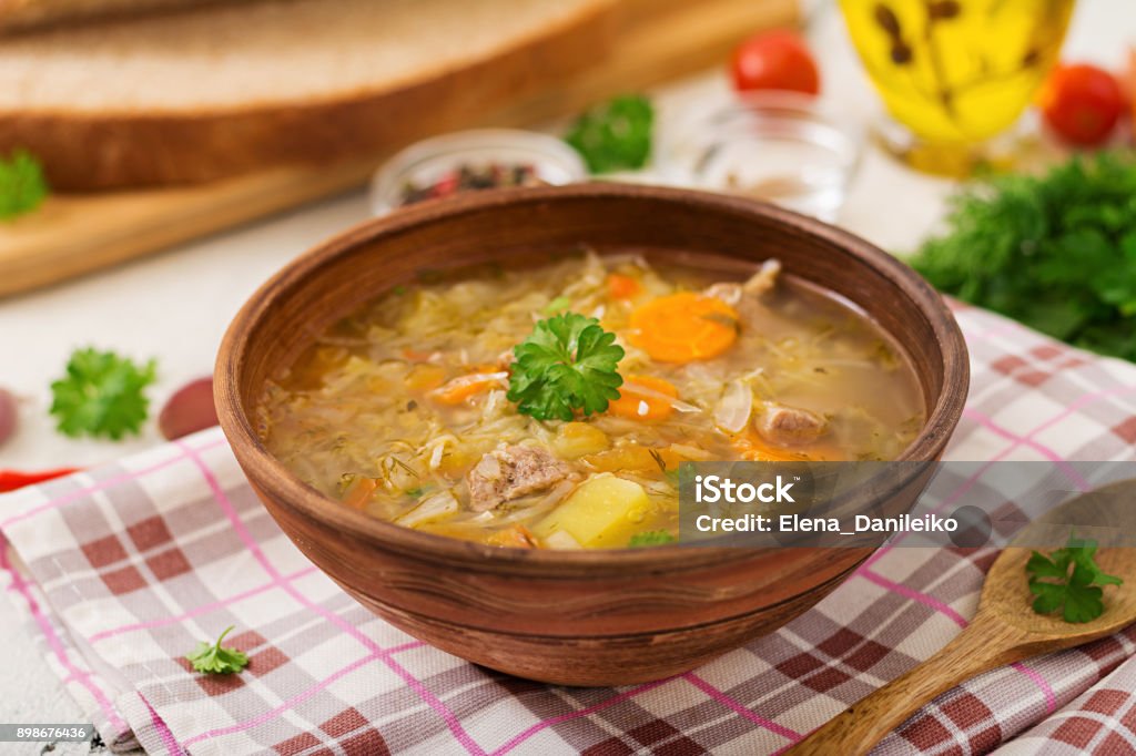 Traditional Russian soup with cabbage - sauerkraut soup. Soup Stock Photo