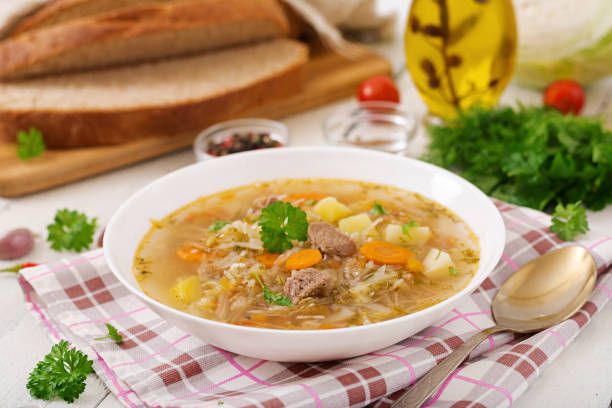 istock Traditional Russian soup with cabbage - sauerkraut soup. 898676444