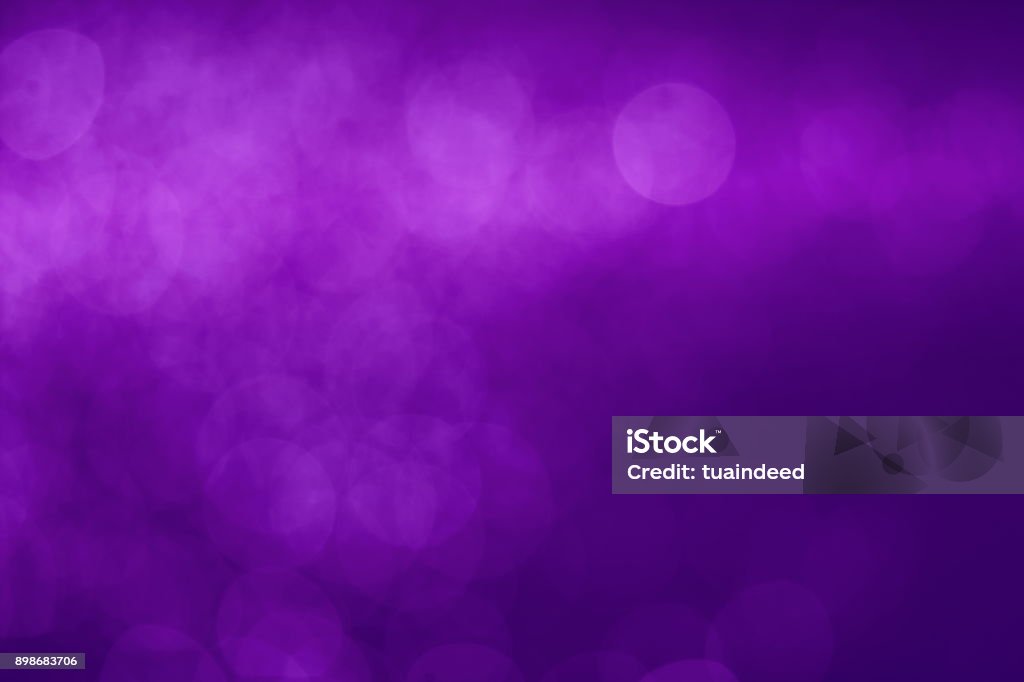 Abstract purple light bokeh defocused background Purple Stock Photo