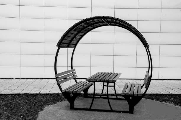 istock banches and the table in garden 898684286