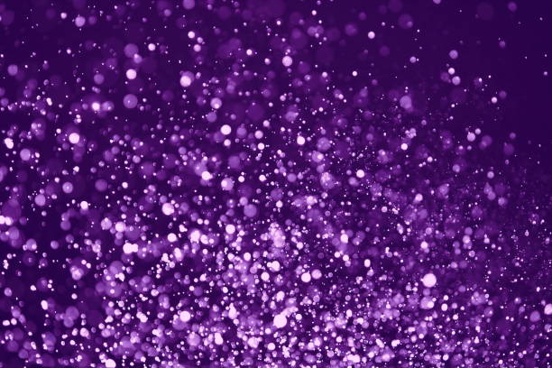 istock Abstract purple light bokeh defocused background 898686560