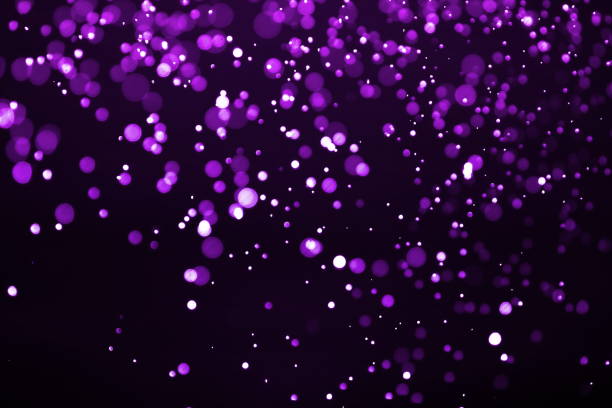 istock Abstract purple light bokeh defocused background 898686600