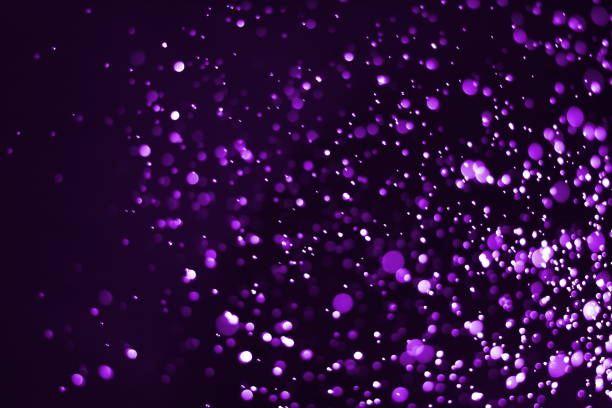 istock Abstract purple light bokeh defocused background 898686668