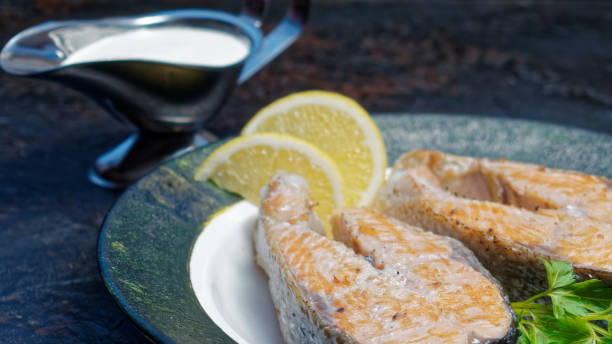 istock Salmon steaks with cream sauce 898686770