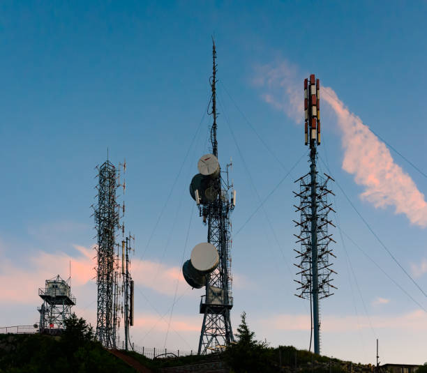 istock Ground view of telecommunication towers 898691078