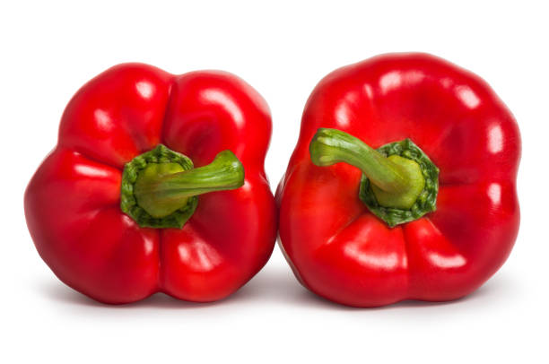 istock Two red sweet peppers isolated 898694944