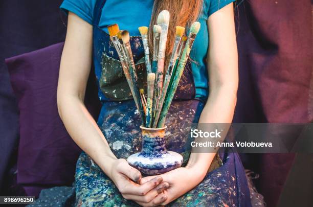 Closeup Of Female Artist Hands With Paintbrushes Stock Photo - Download Image Now - Art, Workshop, Women