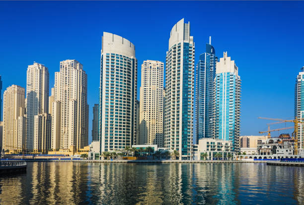 istock High rise buildings and streets in Dubai, UAE 898696508