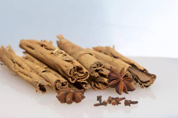 istock Spices. Cinnamon, cloves and anise on white background. 898699218