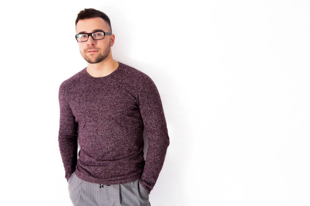 istock Handsome serious man in glasses isolated on a white background 898700210