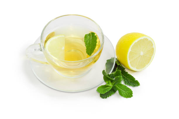 istock Tea with mint and lemon on a white background 898707176
