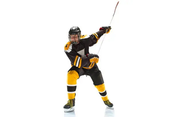 The one caucasian man hockey player in studio isolated on white background
