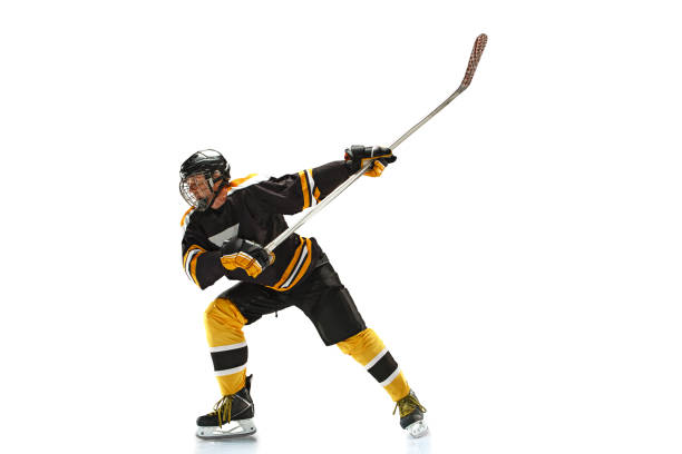 istock one caucasian man hockey player in studio silhouette isolated on white background 898708990