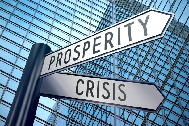 istock Signpost illustration, two arrows - crisis and prosperity 898719880