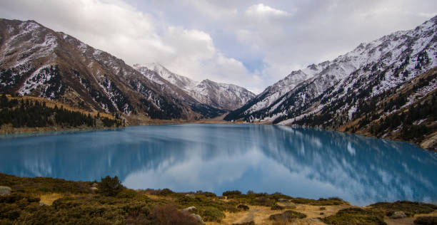 istock mountain emerald lake, Kazakhstan, Almaty 898721018