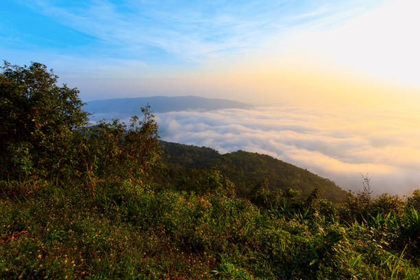 istock sunrise time and mist around mountain 898724738