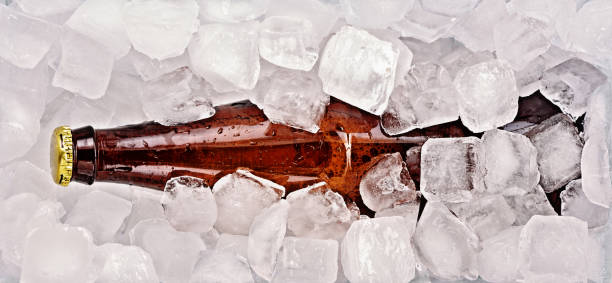 istock bottle of beer on ice cubes 898736844