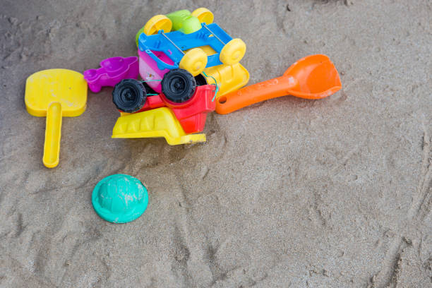 istock toys on tropical sand beach 898741102