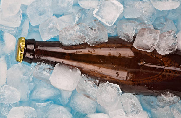 istock bottle of beer on ice cubes 898744362