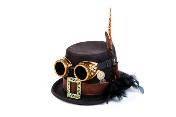 Steampunk hat and goggles in front of white bakground