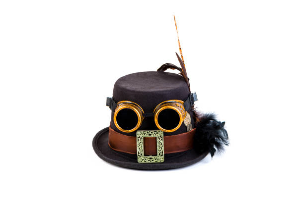 Steampunk hat and goggles in front of white bakground
