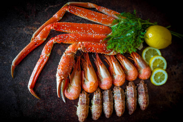 istock Seafood. Crab Legs. crab legs with fresh lemon 898762246