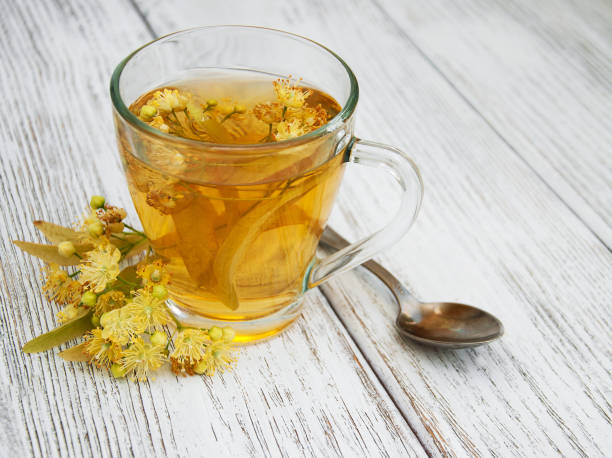 istock cup of herbal tea with linden flowers 898764626