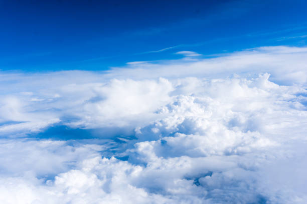 istock Clouds. View of Clouds and sky from airplane window 898764712