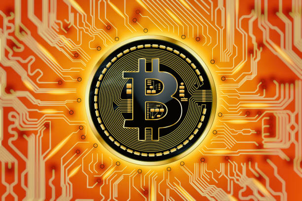 istock Circuit board and Bitcoin cryptocurrency coin over red and orange background 898771786