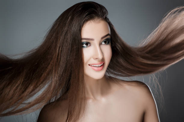istock beautiful woman with green evening make-up 898772238