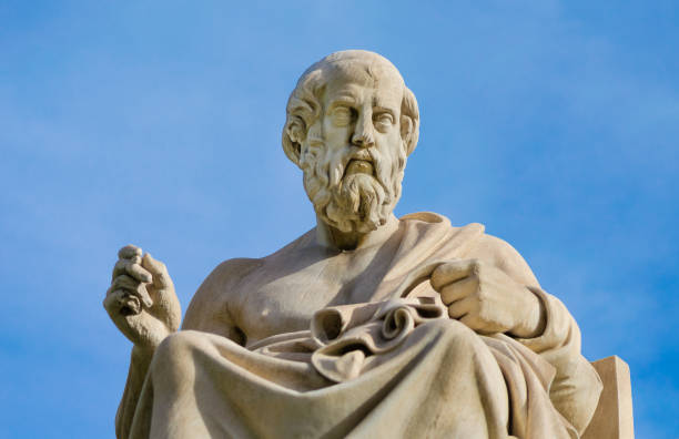 close-up of a marble statue of the great greek philosopher plato on background the sky. - plato philosopher statue greek culture imagens e fotografias de stock