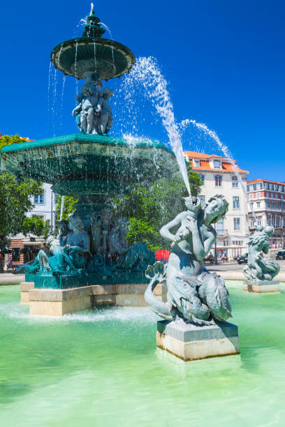 istock Old fountain on the Rossio Square, Lisbon 898776912