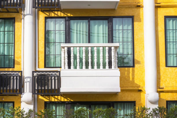 istock White balcony with yellow walls 898780538